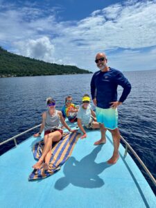 Relaxing on the dive boat Lumbalumba Resort Bunaken